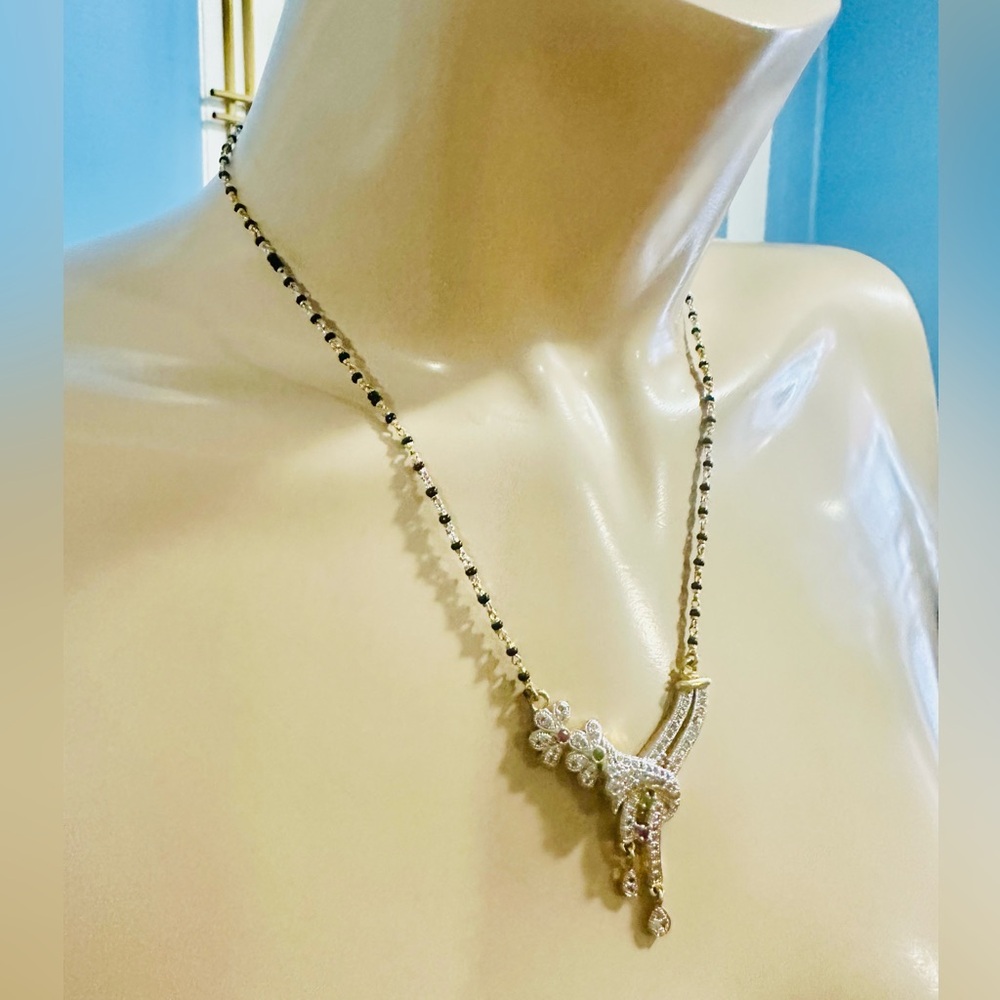 Elegant Gold and Black Necklace